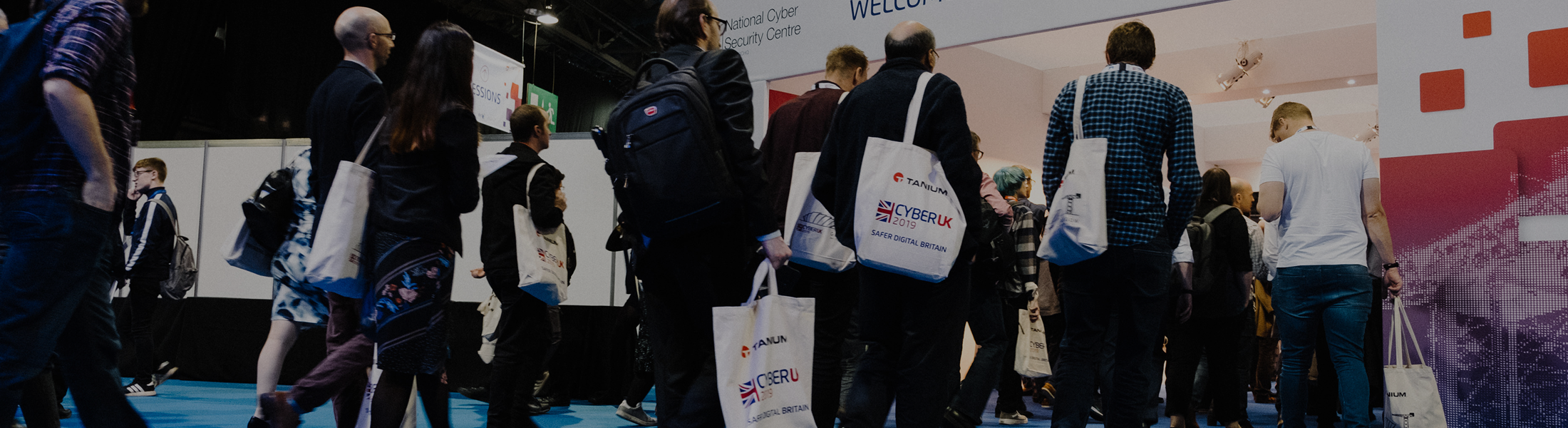 A group of delegates walking into CYBERUK 